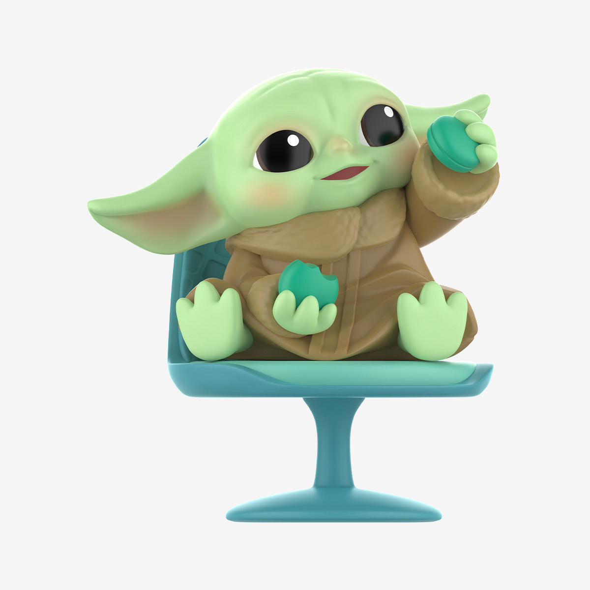 Grogu figure eating cookies from Star Wars Mandalorian Series