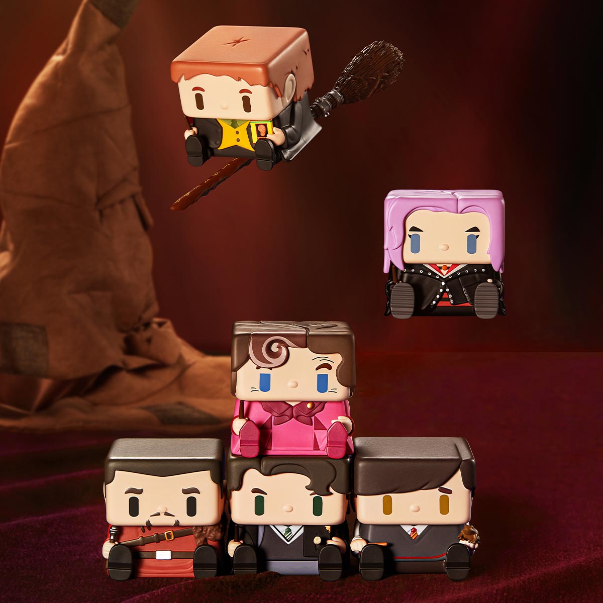Pop Mart POP CUBE-1 Series figures including Umbridge, Tom Riddle, Neville, Tonks, Viktor Krum, and Fred Weasley