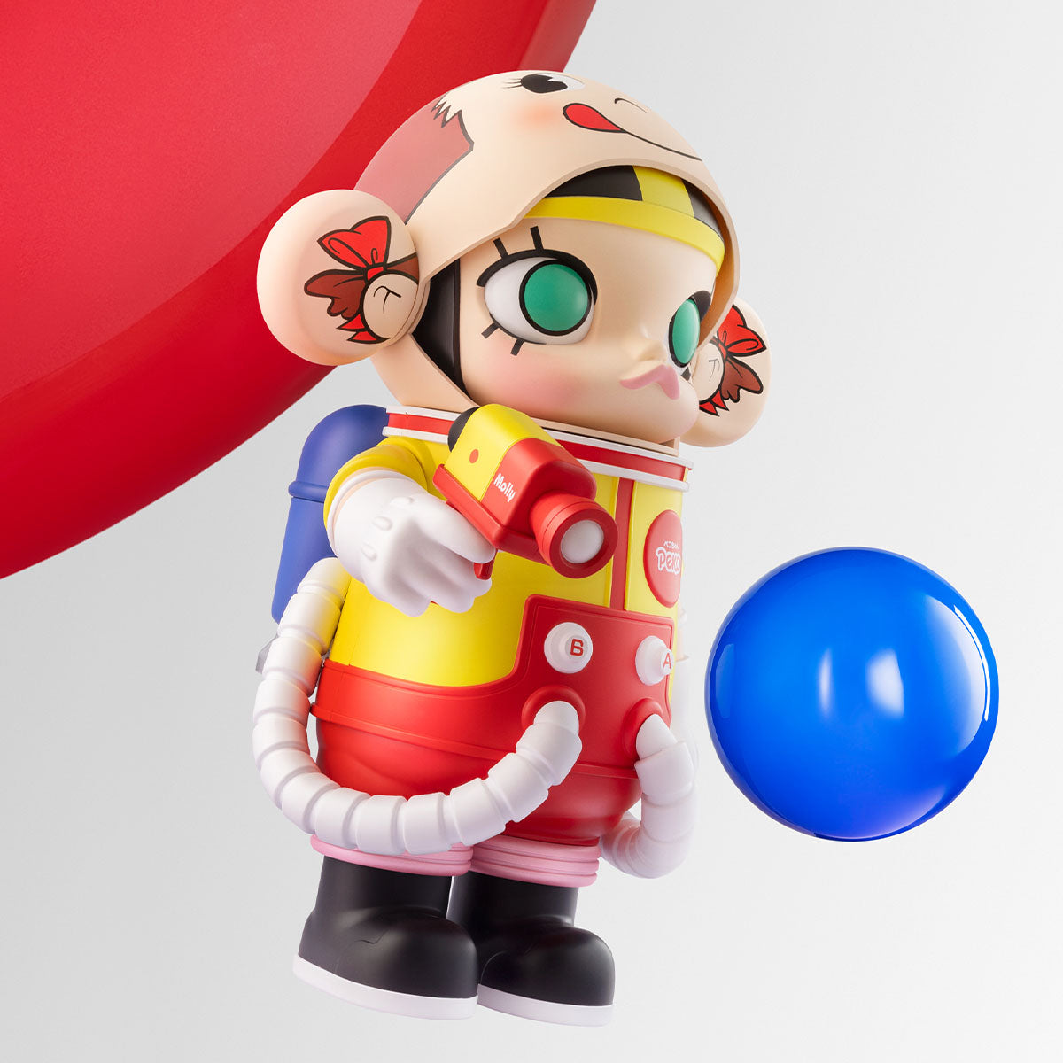 Pop Mart MEGA SPACE MOLLY 400% PEKO colorful astronaut figure in red and yellow outfit with blue balloon against red and white background